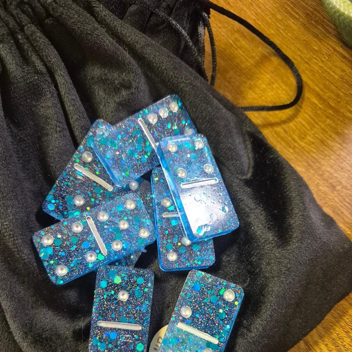 Handmade blue glitter dominoes with