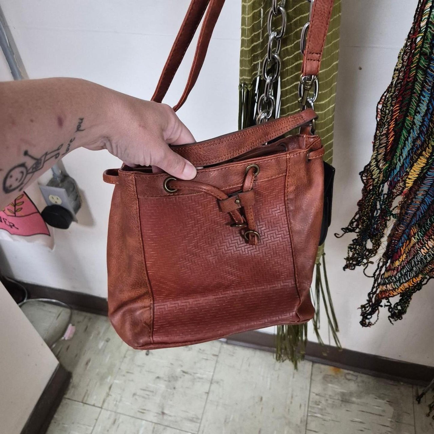 Brown leather handbag with woven