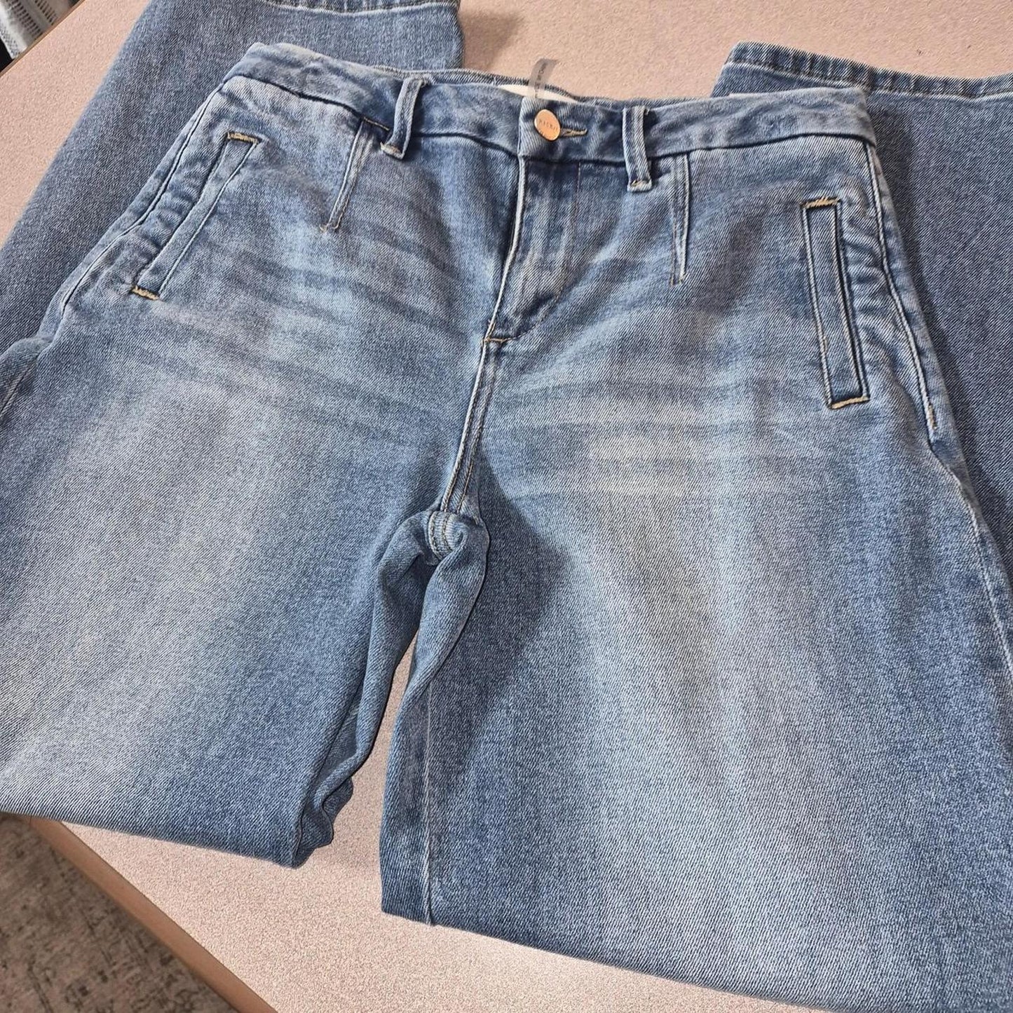 High waisted blue denim jeans with