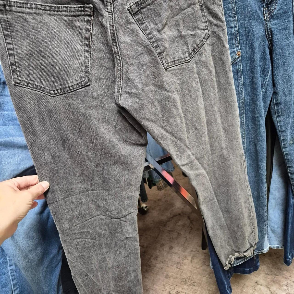 Gray distressed jeans with ripped