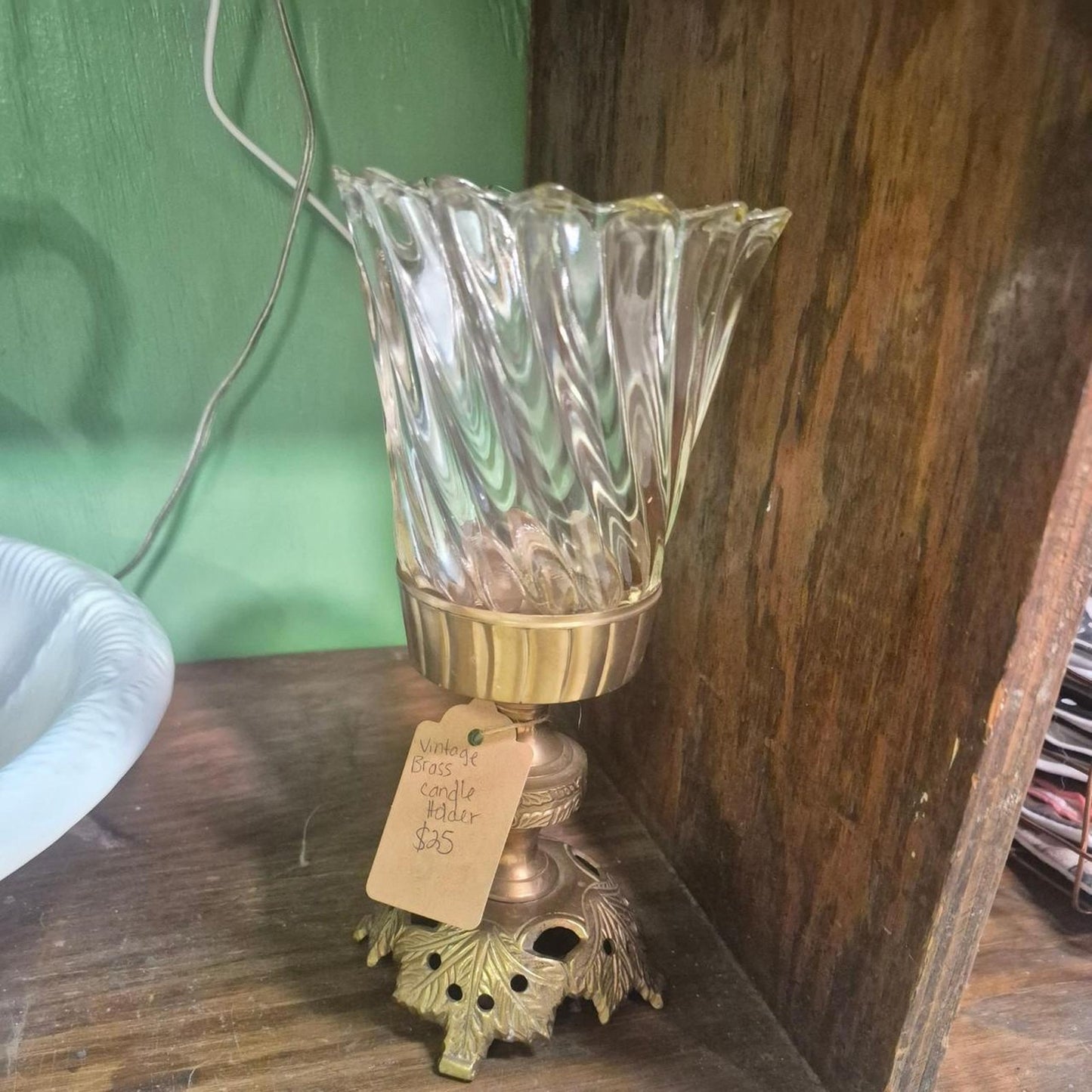 Glass candle holder with brass