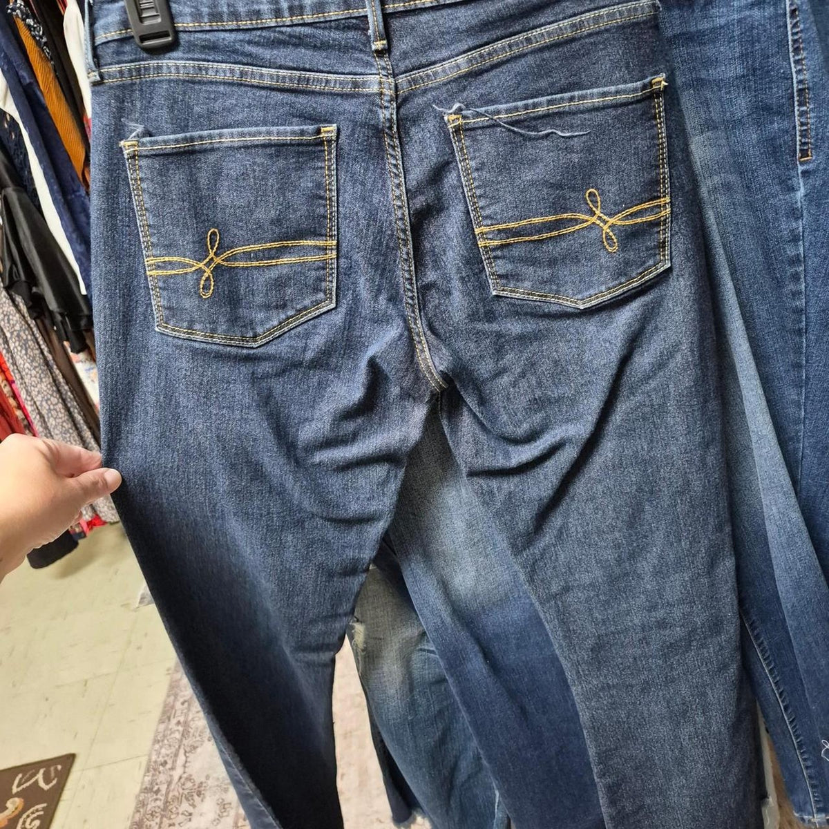 Blue denim jeans with gold