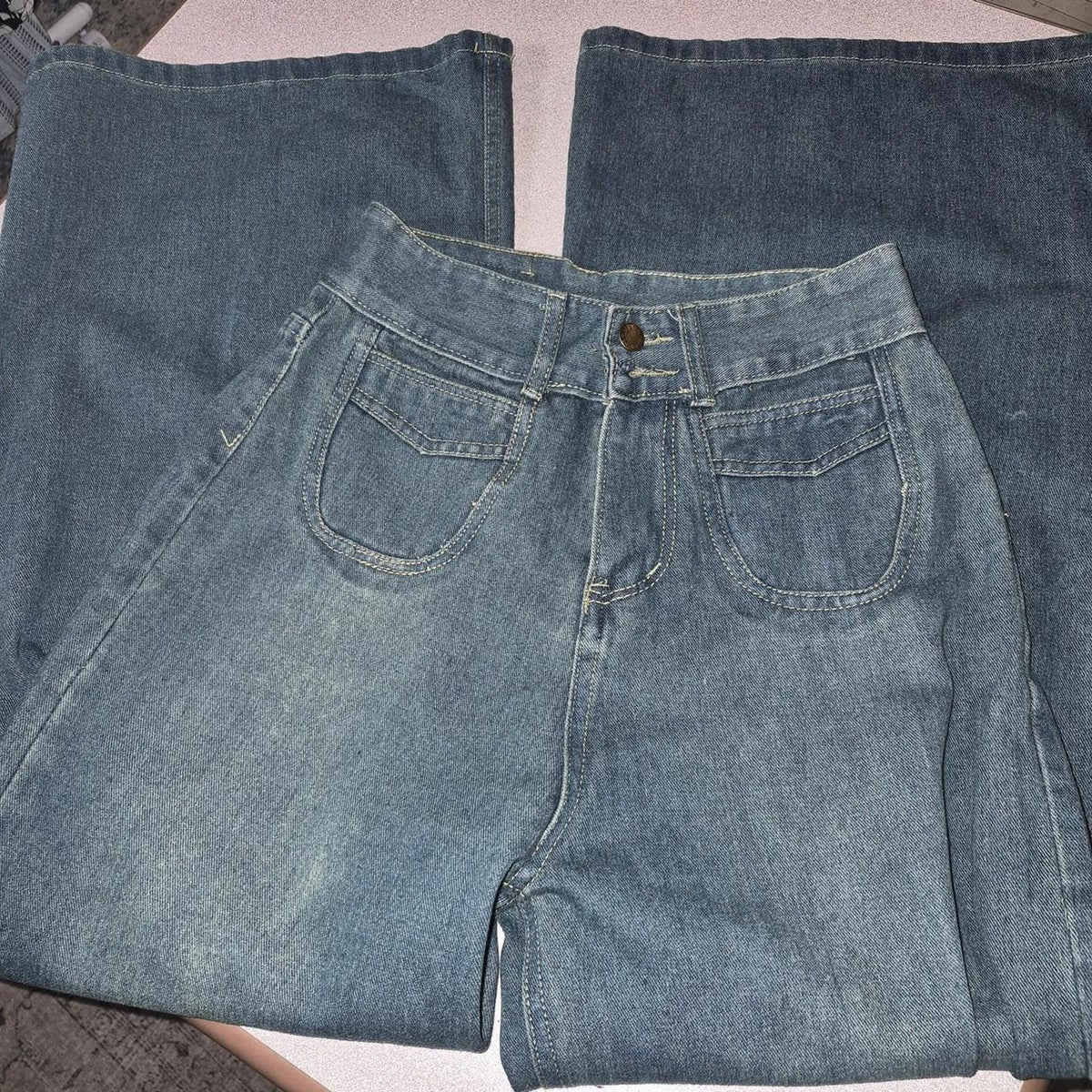 High waisted blue denim jeans with