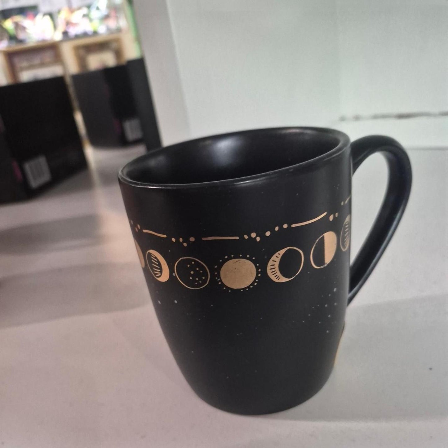 Black mug with gold moon