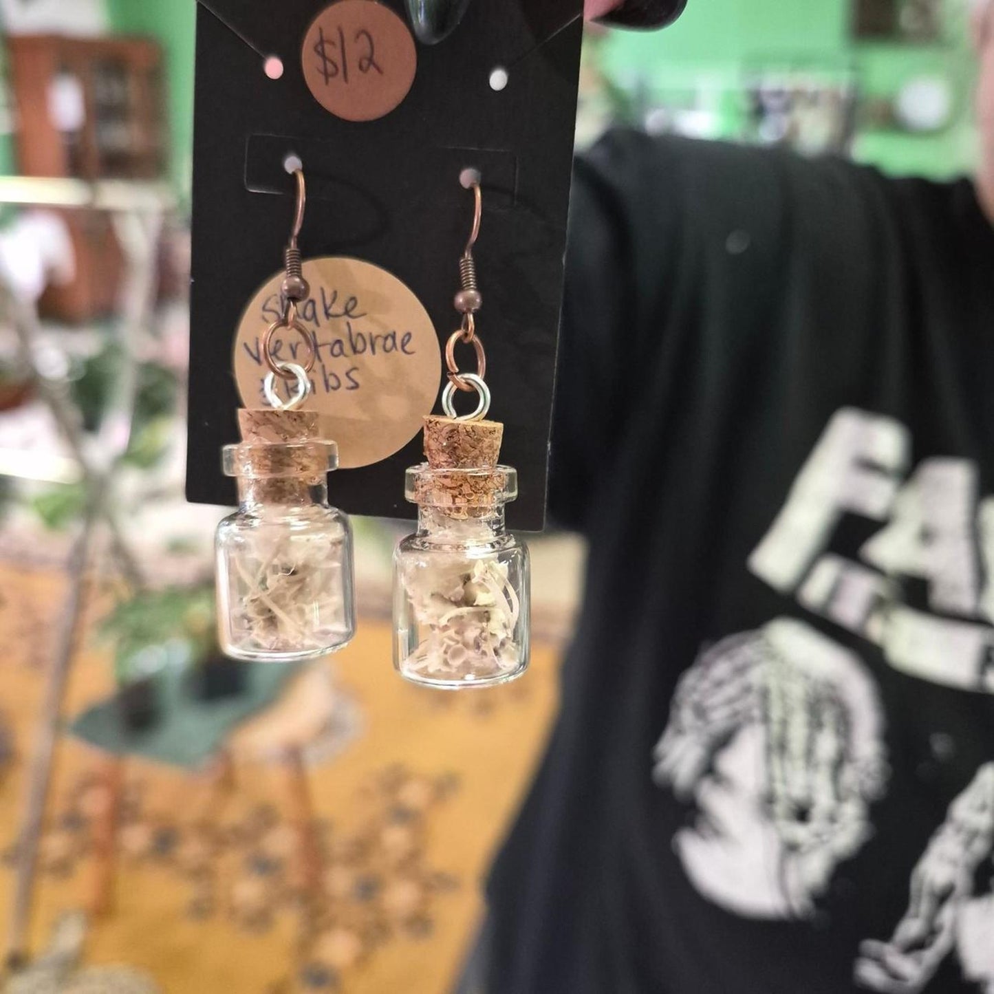 Snake vertebrae earrings in glass
