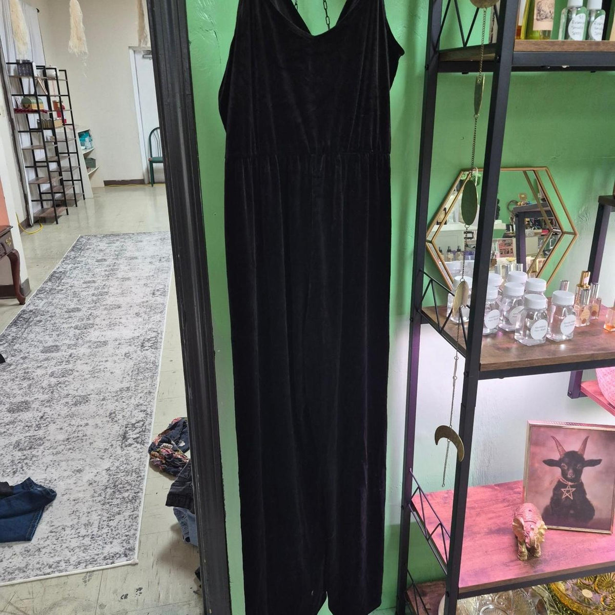 Black velvet jumpsuit with a