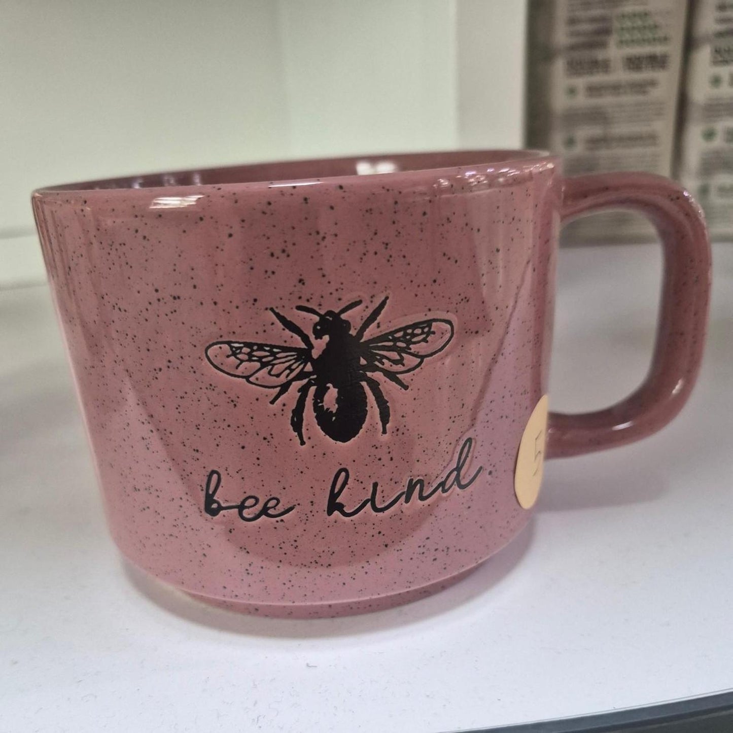Pink speckled mug with black
