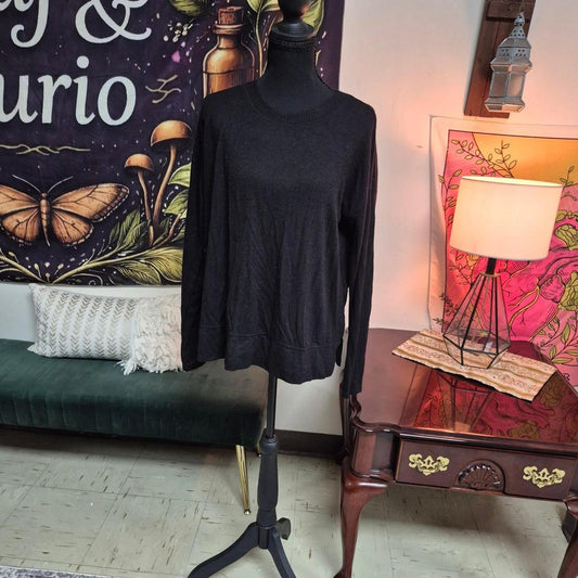Black long sleeve sweater with