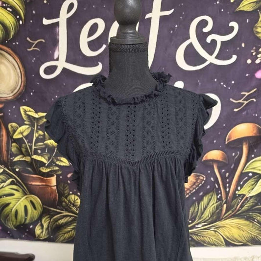 Black babydoll blouse with eyelet
