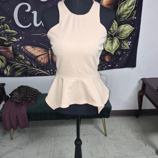 Orange ribbed knit peplum top