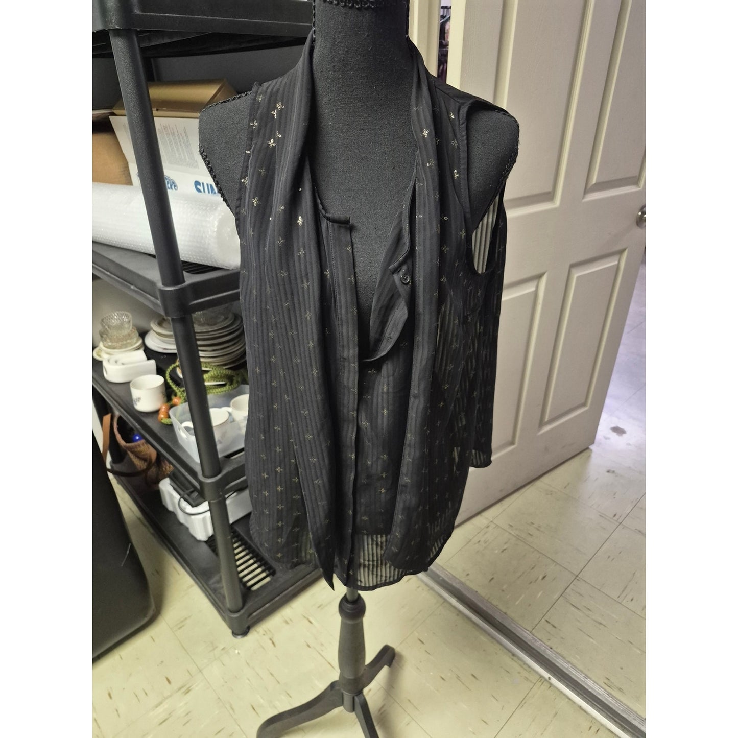 Sleeveless Black Sheer Shirt with Metallic Star Detail