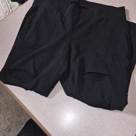 Black leggings with mesh panels