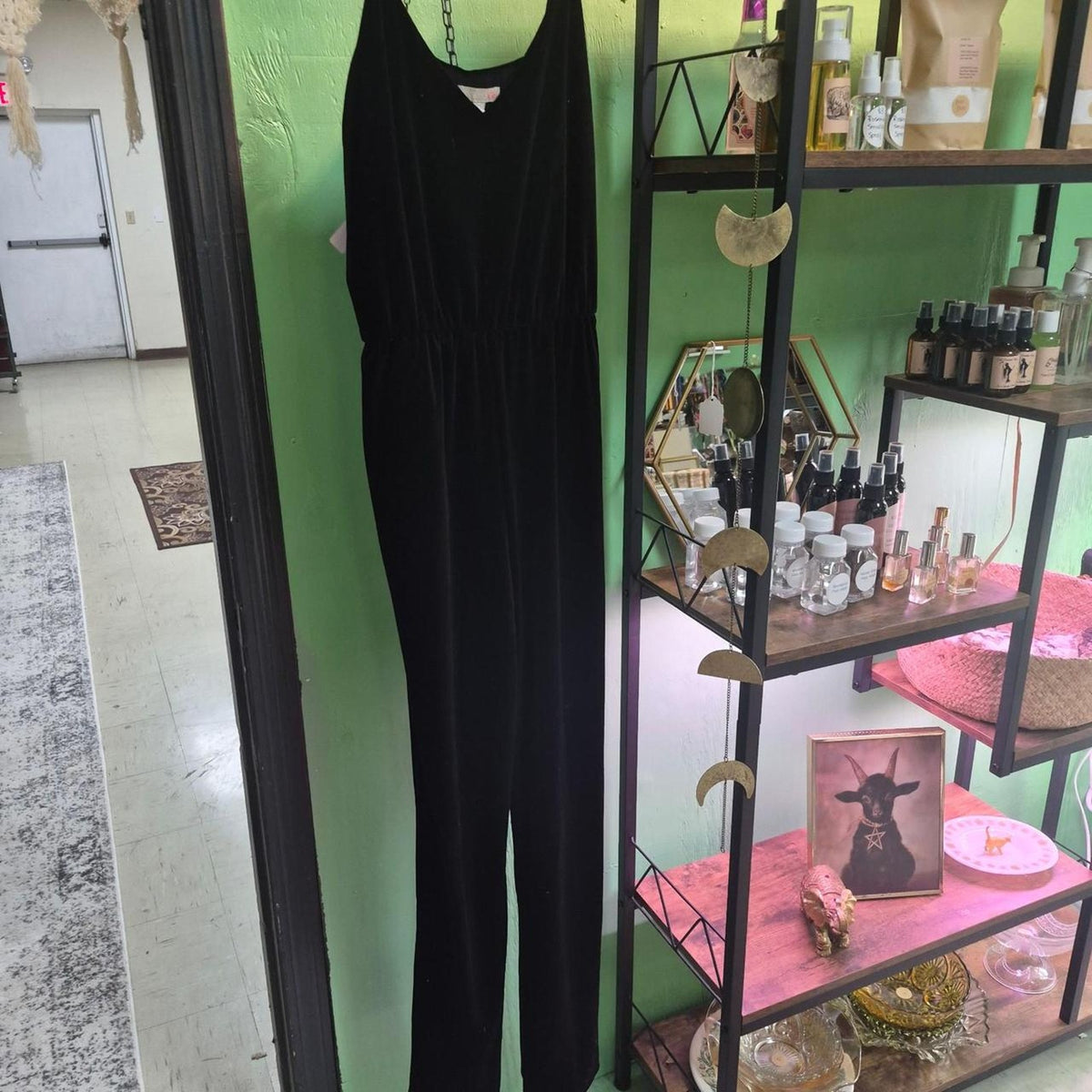 Black velvet jumpsuit with a
