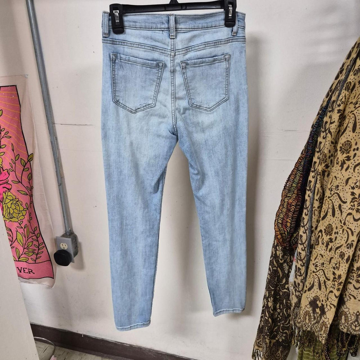 Light wash distressed skinny jeans