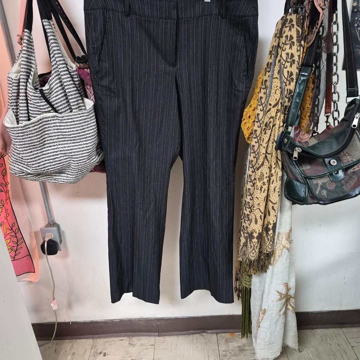 Black pinstripe pants with thin