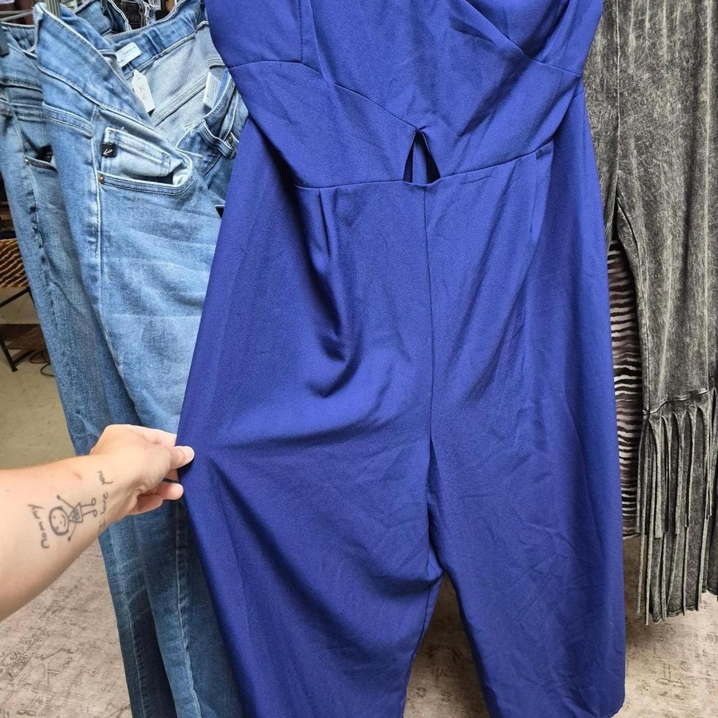 Blue jumpsuit with zipper detail