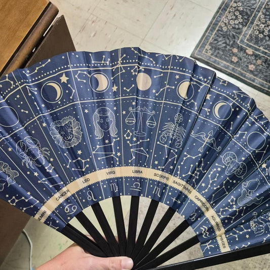 Blue zodiac constellation fan with