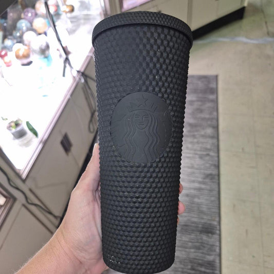 Black starbucks tumbler with textured