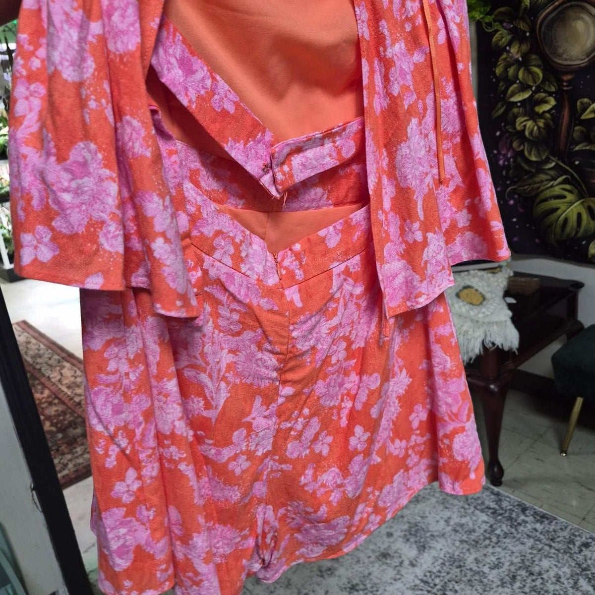 Pink floral print on orange