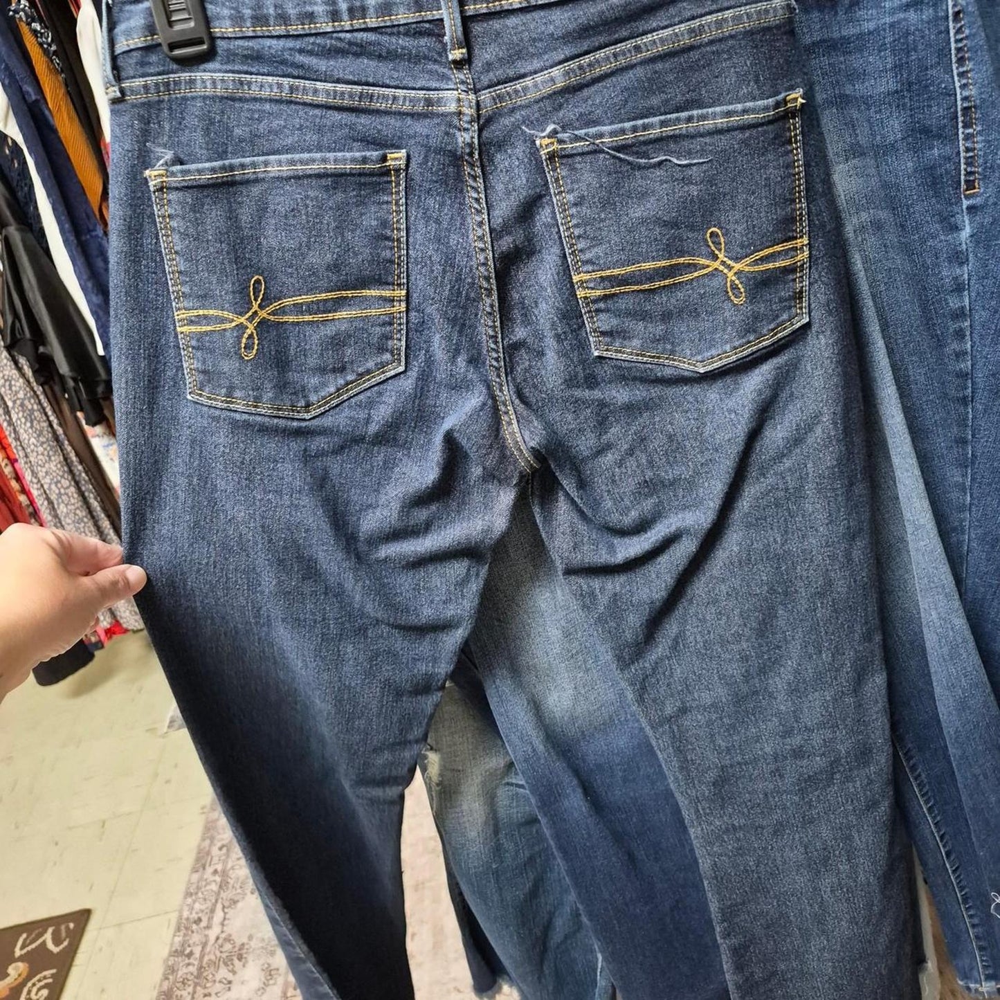 Blue denim jeans with gold