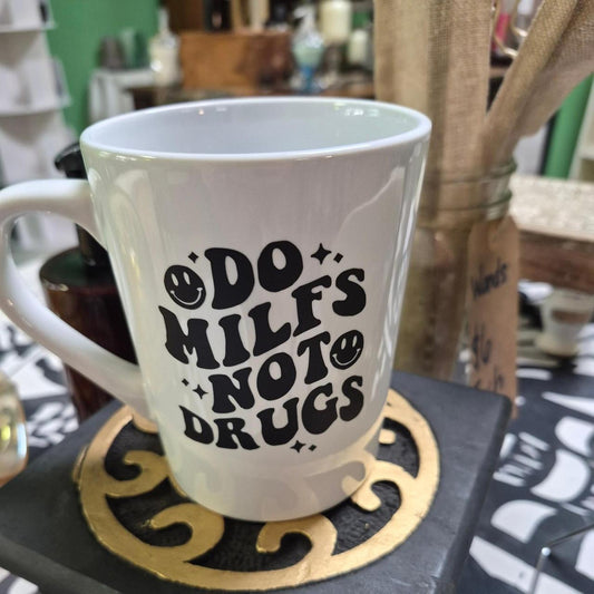 White mug with black text