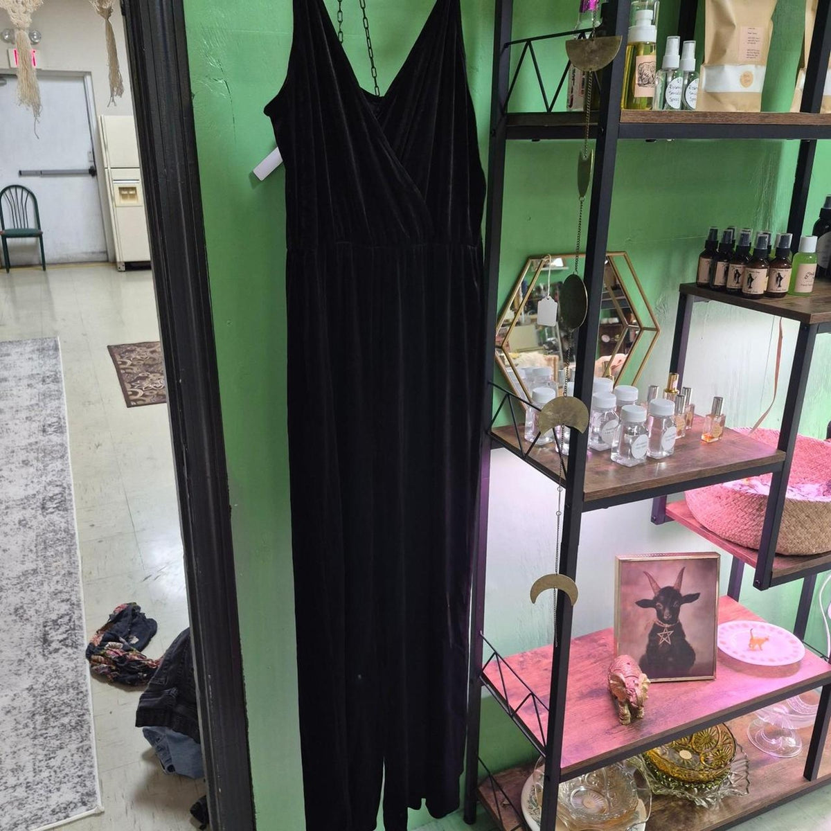 Black velvet jumpsuit with a