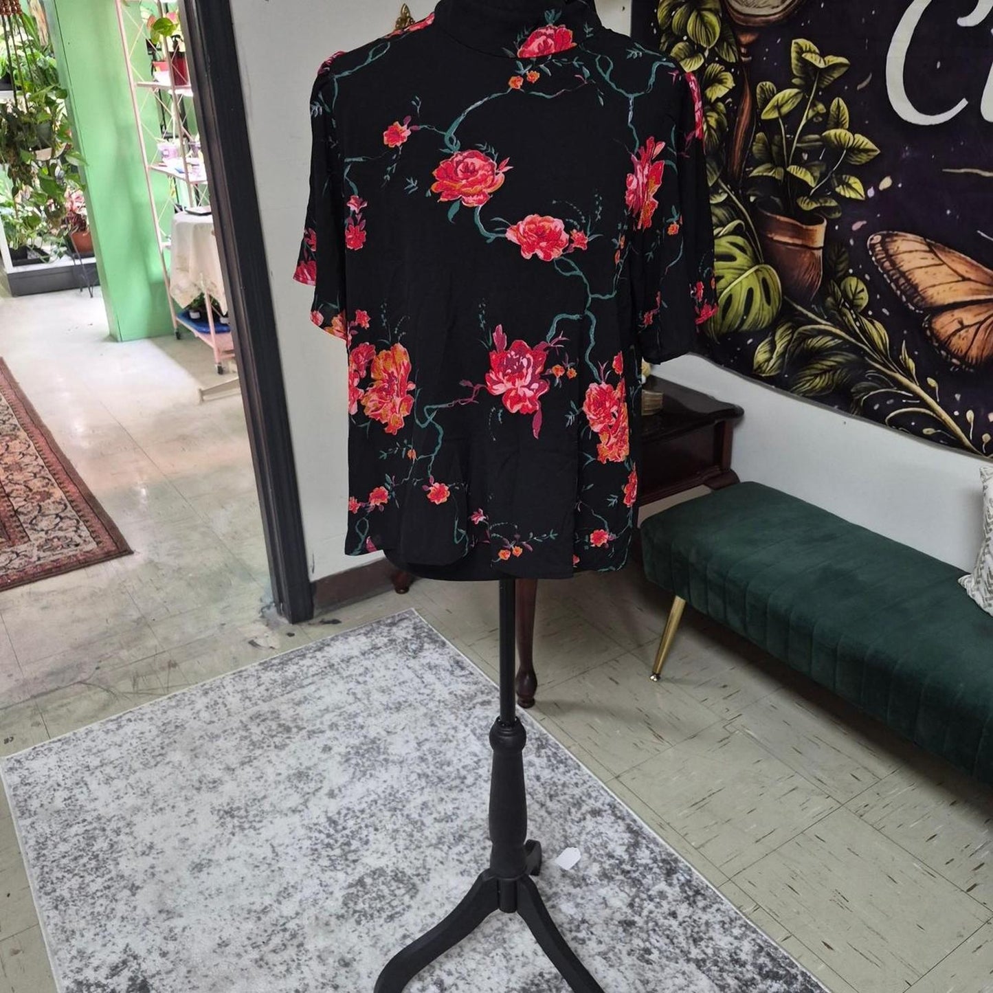 Black floral shirt with red
