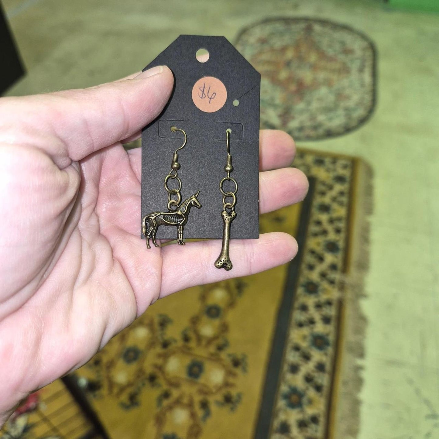 Unicorn and bone earrings in
