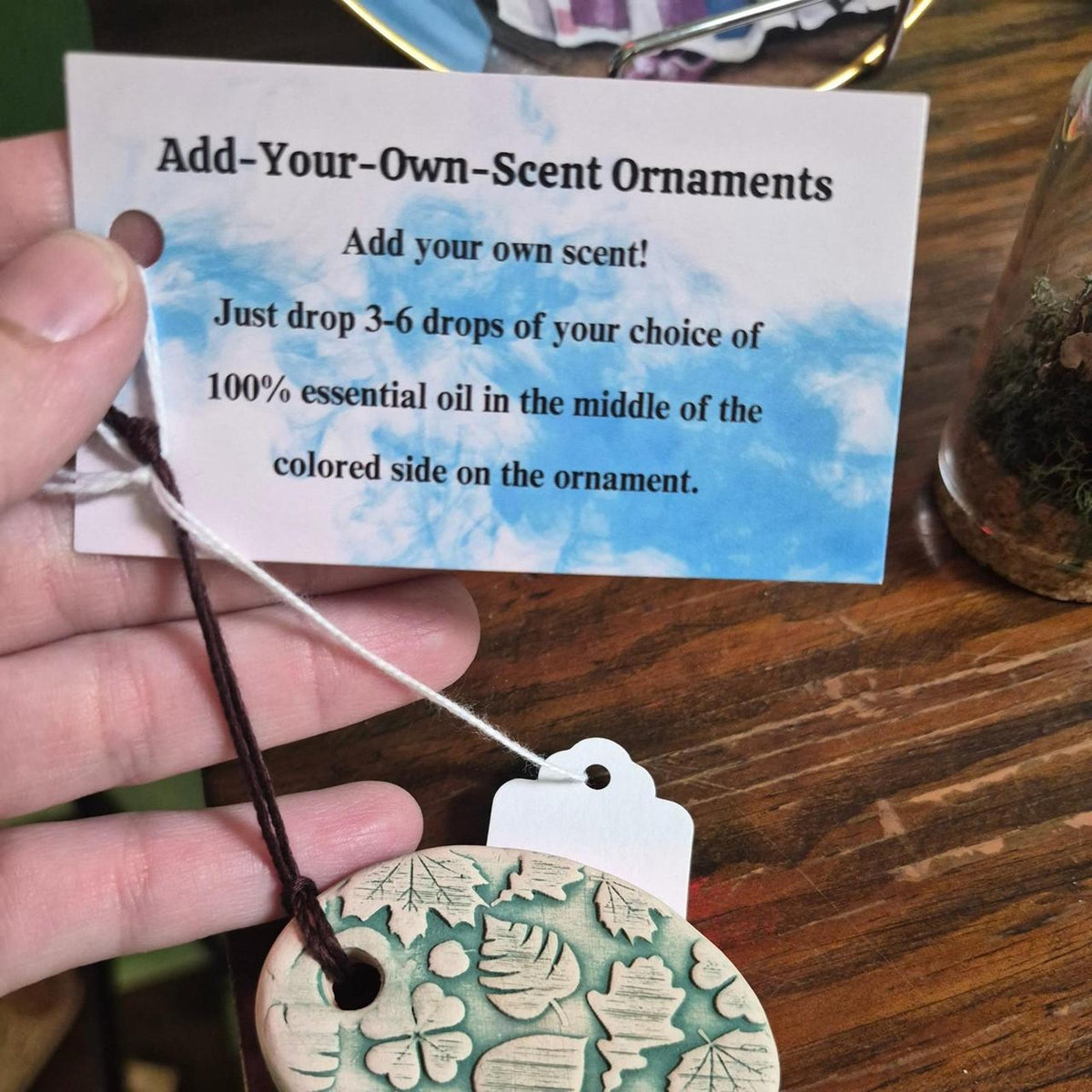 Handmade ceramic ornament with carved