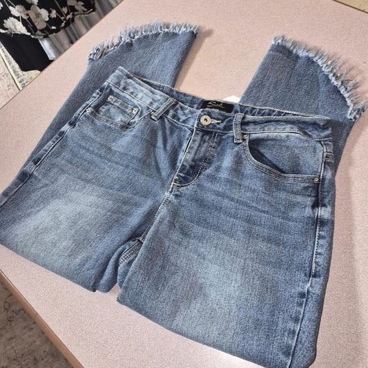 Blue denim jeans with frayed