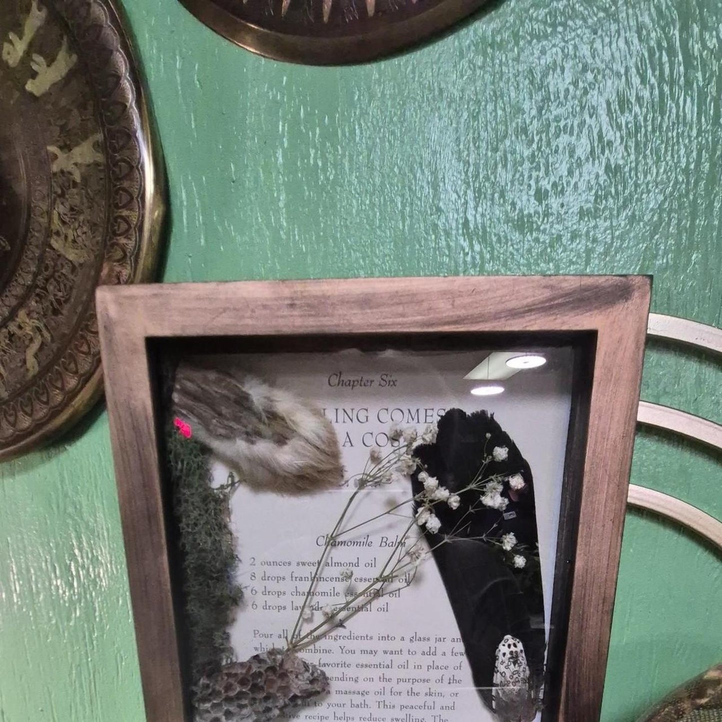 Wooden frame with pressed flowers
