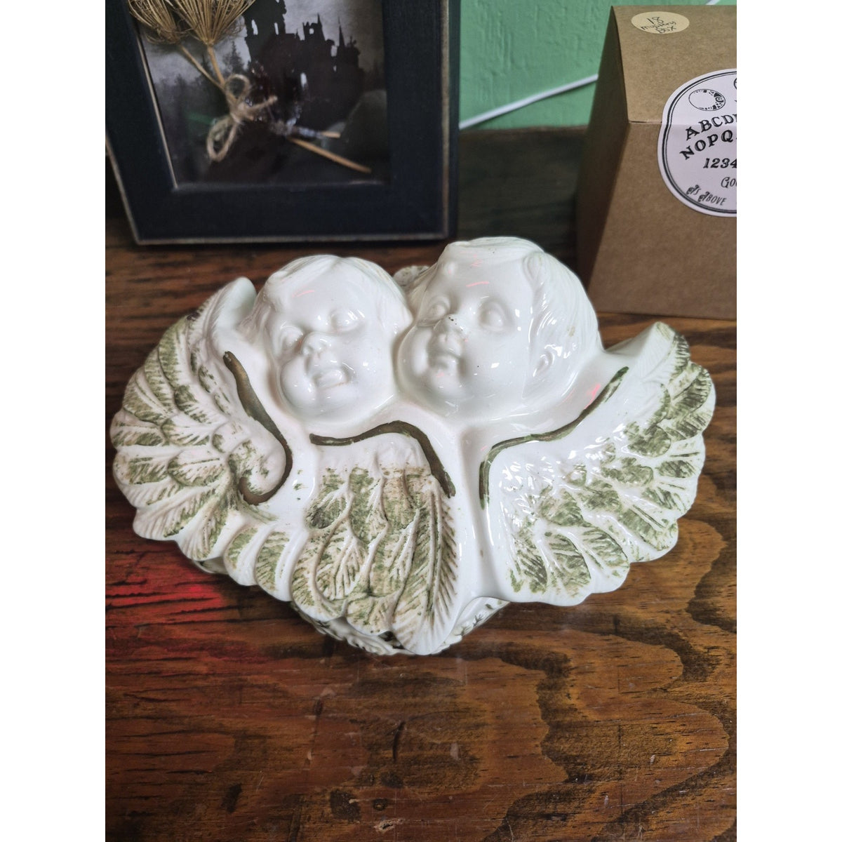 White Ceramic Cherub Angel Trinket Box with Lid, Two Baby Faces on Leaves
