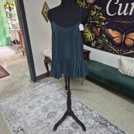 Teal shirt with ruffle hem