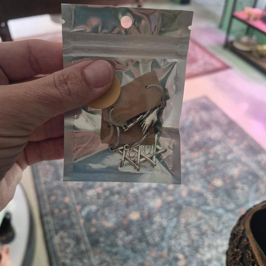 Silver star earrings with a