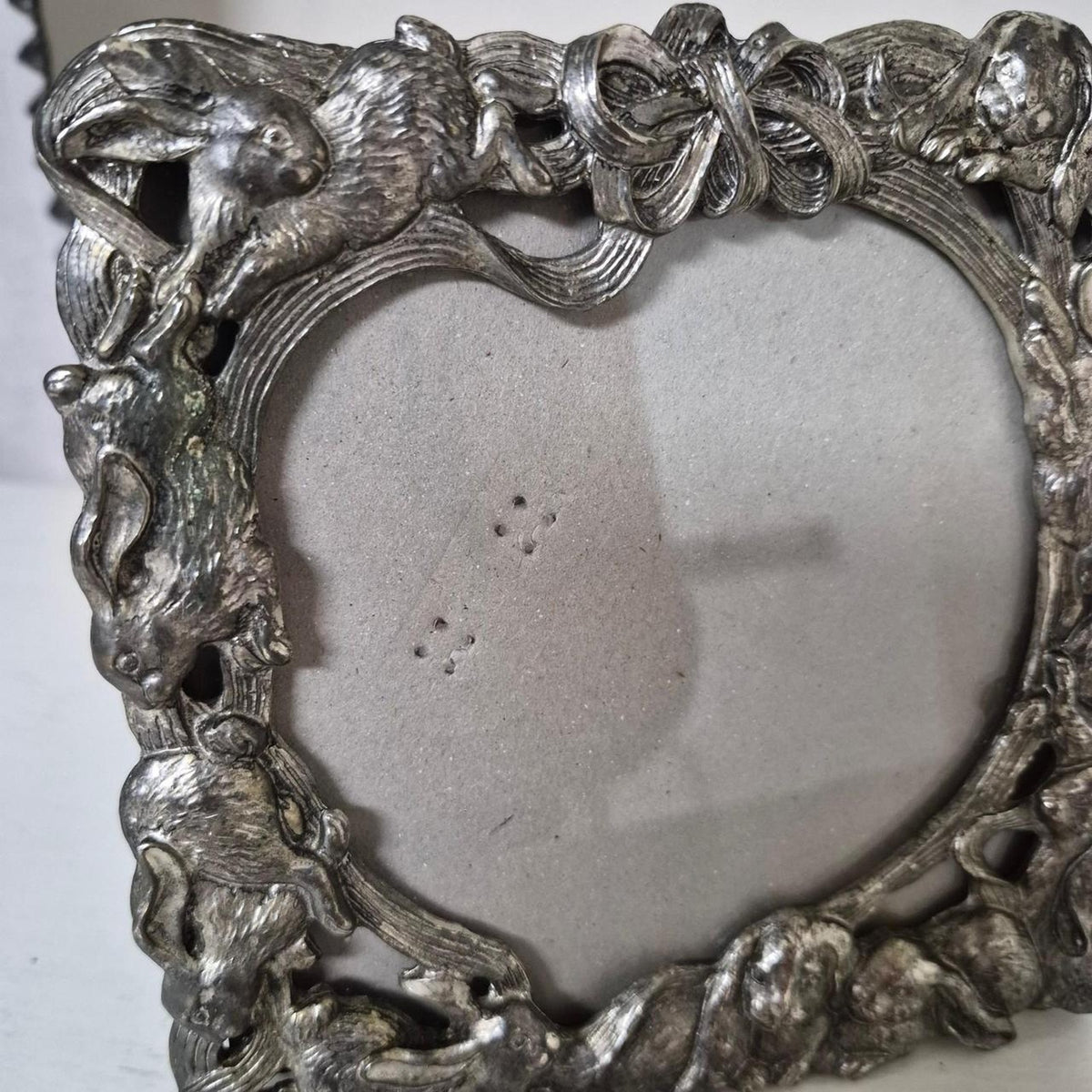 Silver picture frame with bunnies