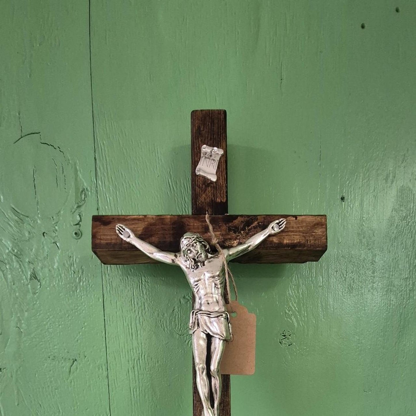 Silver and brown crucifix wall