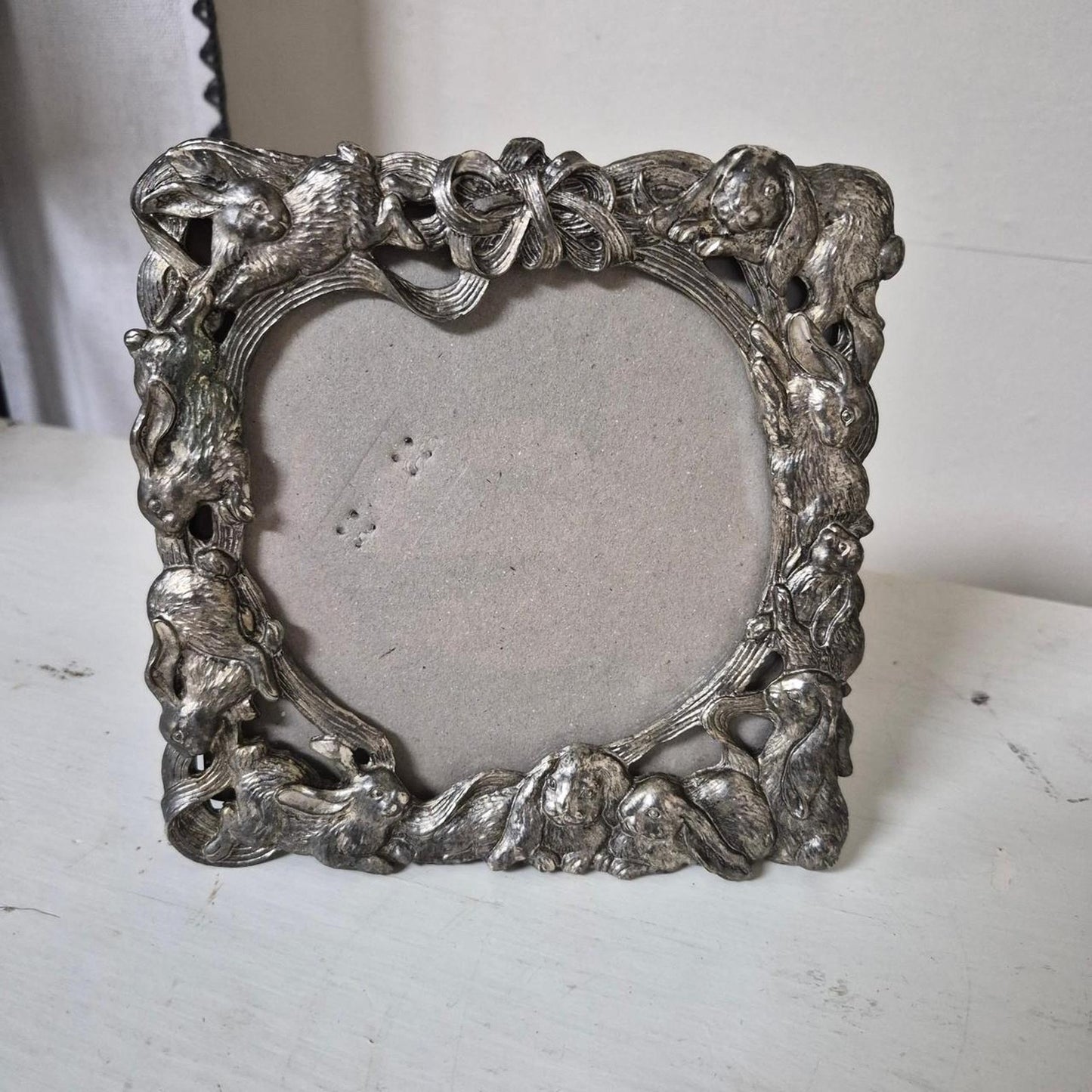 Silver picture frame with bunnies