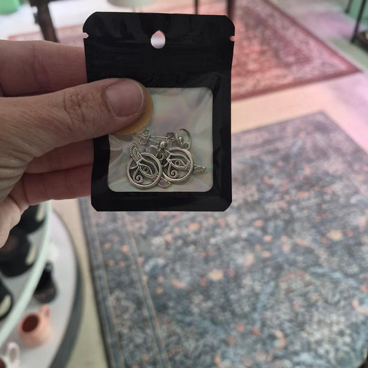 Silver earrings with eye and