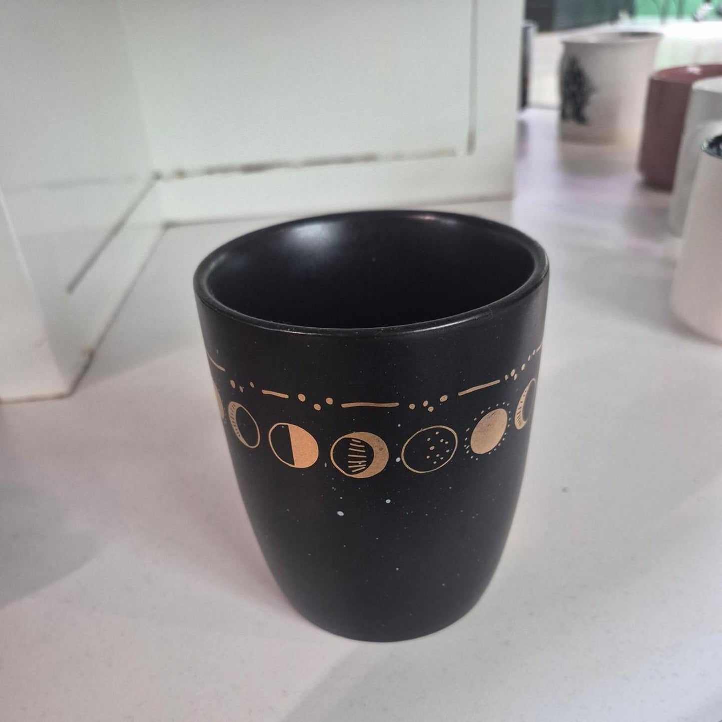 Black mug with gold moon