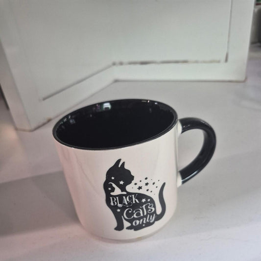 Black cat mug with black