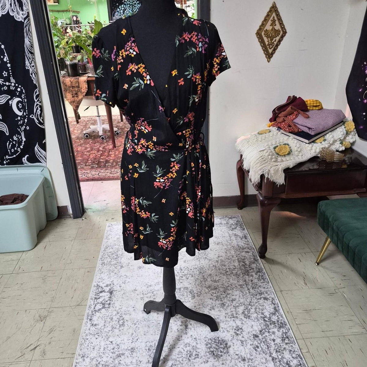 Black floral wrap dress with